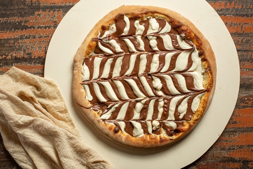 Pizza doce leva queijo? Descubra como são feitas as tradicionais