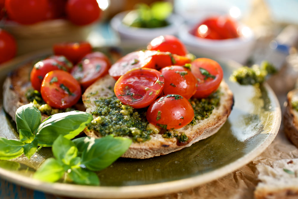 Bruschetta de tomate com Aperitivo Di Ricotta Pesto